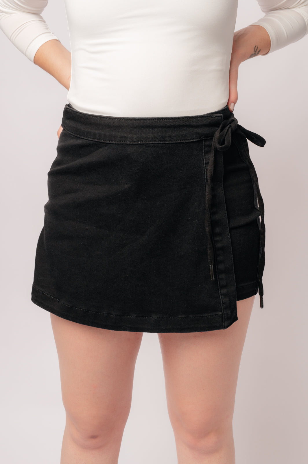 Bentli High Rise Side Tie Denim Skort in Black-Womens-Ave Shops-Market Street Nest, Fashionable Clothing, Shoes and Home Décor Located in Mabank, TX