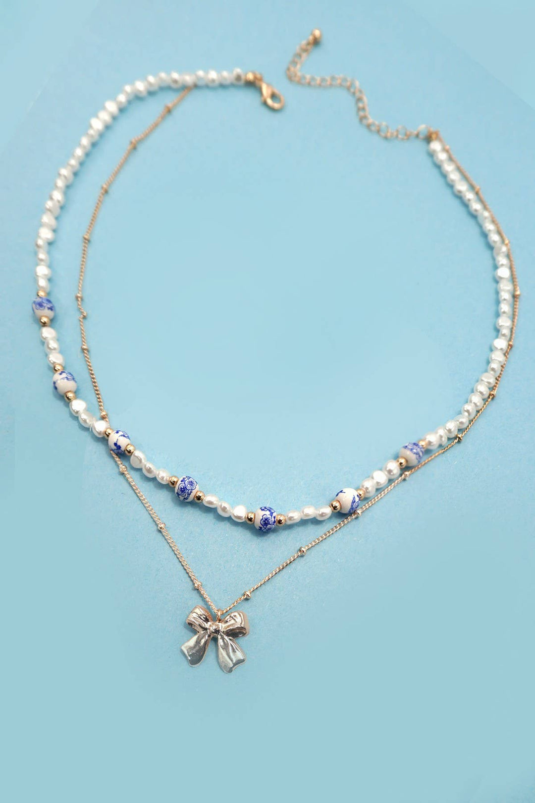 CERAMIC PORCELAIN PEARL BOW LAYER NECKLACE | 80N91555-JOSSLYN by wall to wall-Market Street Nest, Fashionable Clothing, Shoes and Home Décor Located in Mabank, TX
