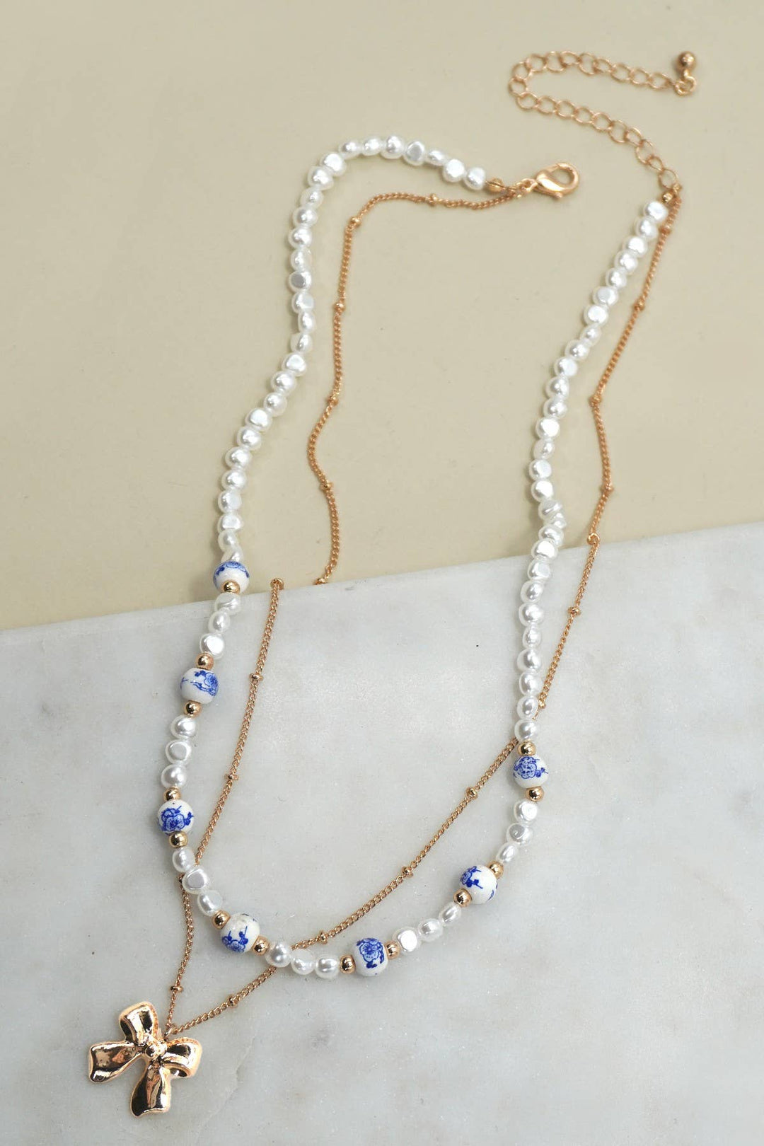 CERAMIC PORCELAIN PEARL BOW LAYER NECKLACE | 80N91555-JOSSLYN by wall to wall-Market Street Nest, Fashionable Clothing, Shoes and Home Décor Located in Mabank, TX