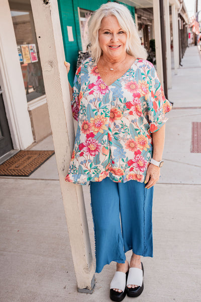 Front View. Satin Floral Print V-Neck Ruffle Hem Top - Cream-Tops-Umgee USA Inc-Market Street Nest, Fashionable Clothing, Shoes and Home Décor Located in Mabank, TX