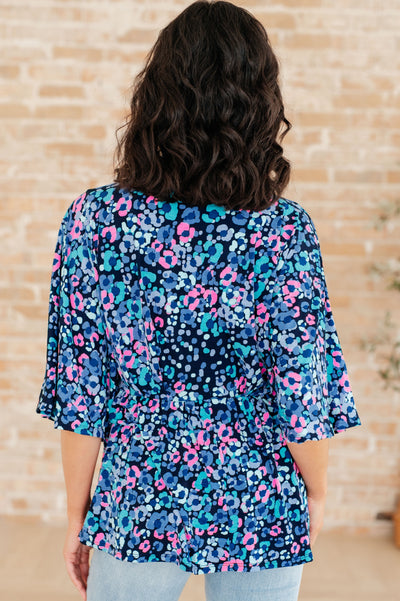 Dreamer Peplum Top in Navy and Lavender Animal Print-Tops-Ave Shops-Market Street Nest, Fashionable Clothing, Shoes and Home Décor Located in Mabank, TX