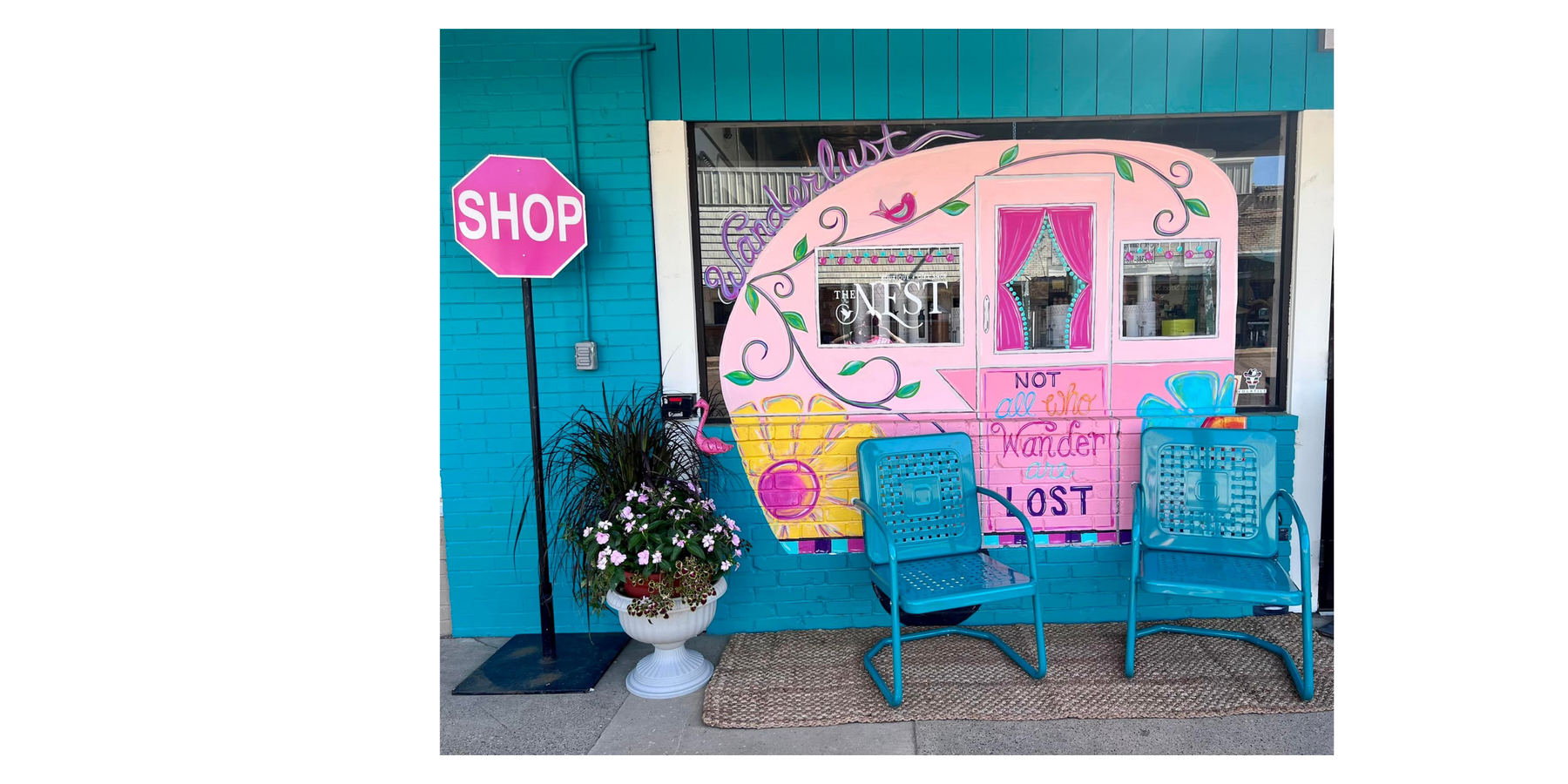 Market Street Nest Window Art | Pink Camper with Floral Accents | Shop Sign and Flowers on the Sidewalk | Mabank, TX